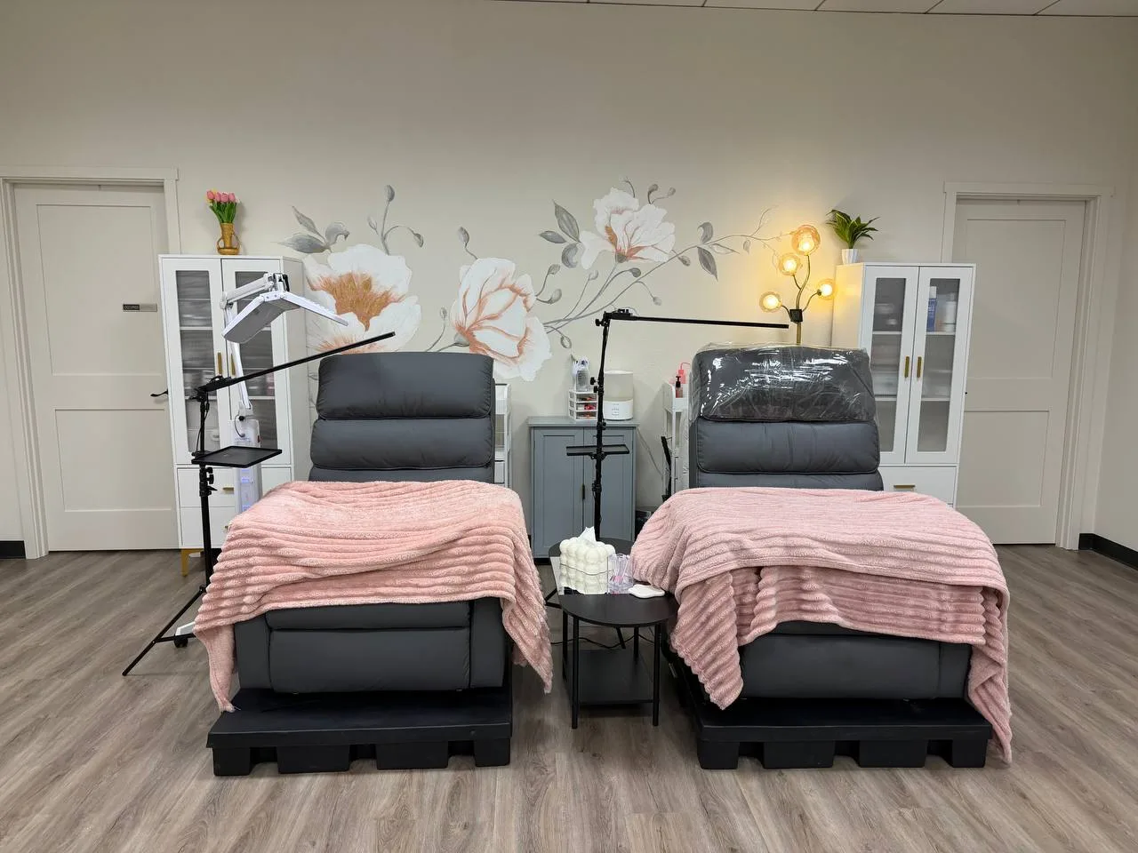Treatment room with two reclining chairs at Beautissima, Bothell WA